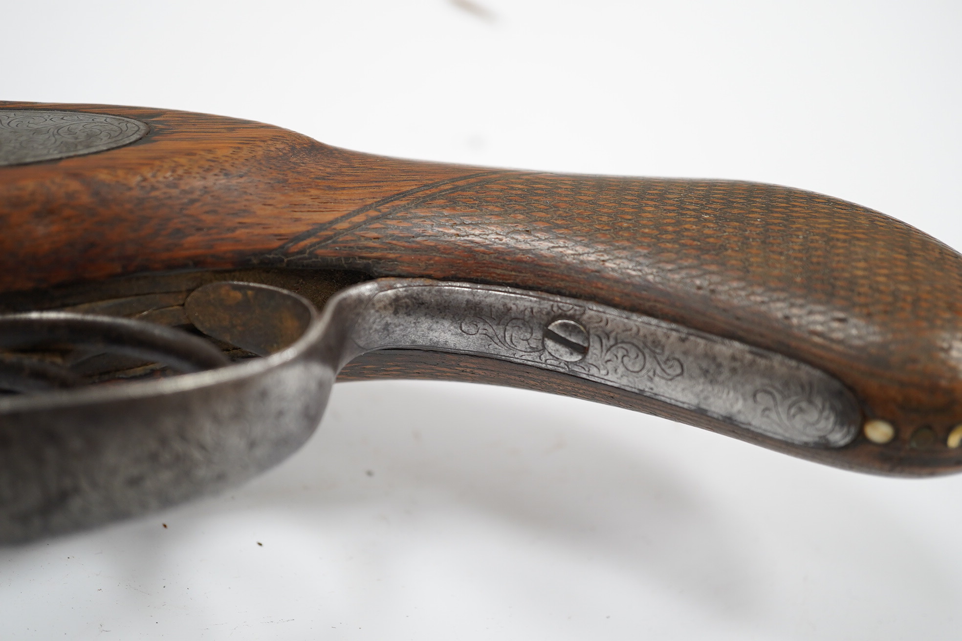 A Turkish flintlock Kubar pistol, with fully stocked brass mounts, polished steel lock and barrel (well worn), barrel 31cm, and a double barrel 12 bore percussion pistol cut down from a sporting gun, barrel 26.5cm, (2).